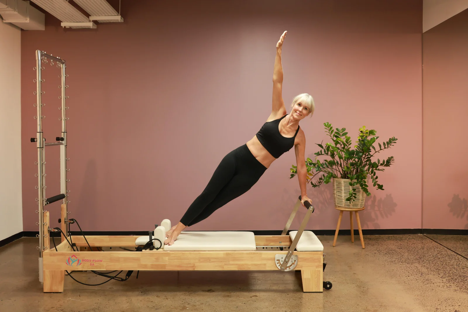 Side plank on the reformer